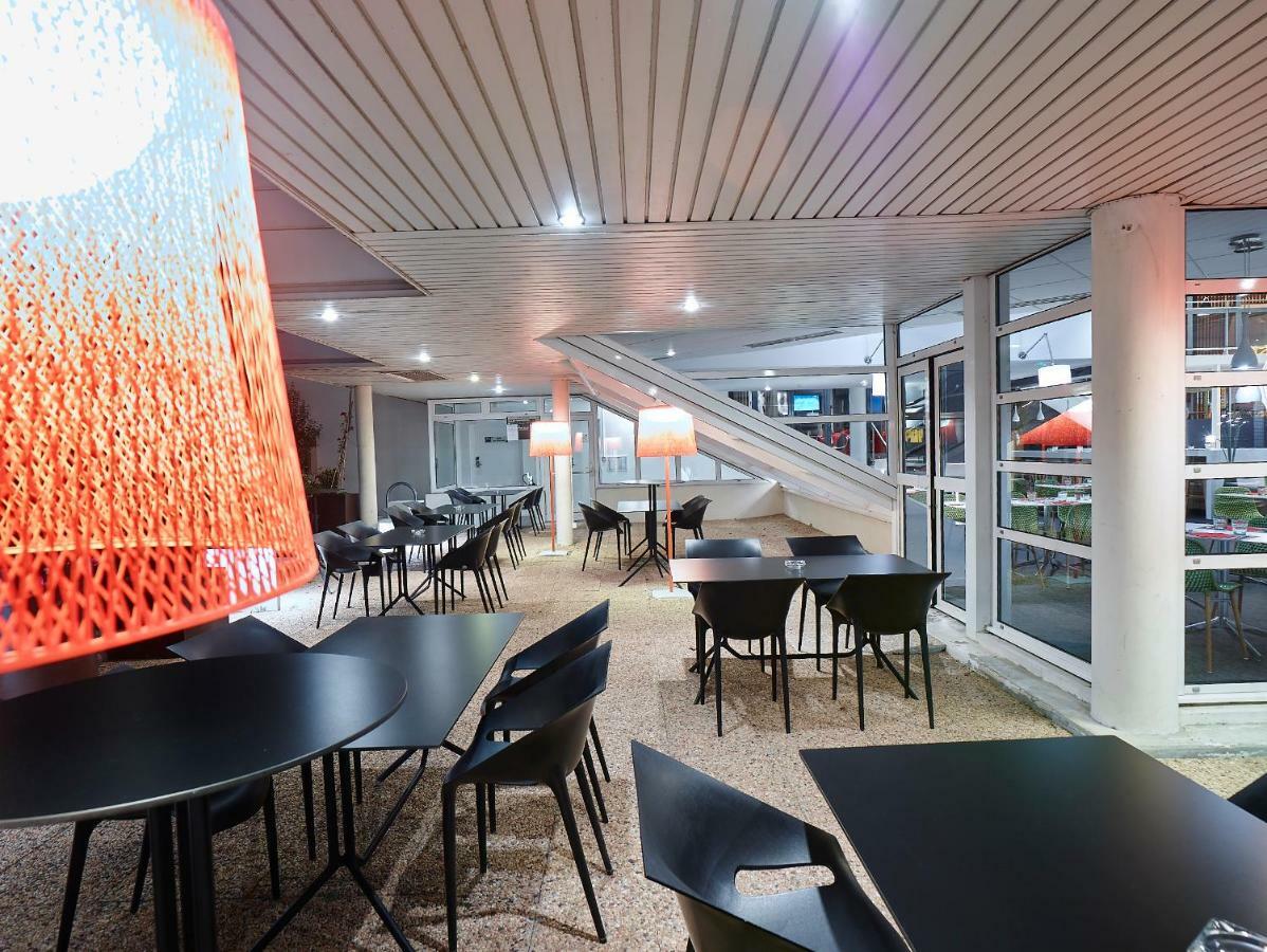 Отель Ibis Site Du Futuroscope Чассенеуил-Ду-Поитоу Экстерьер фото
